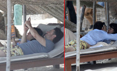 Yarı yaşındaki sevgilisiyle tatilde: Kitabı elinden bıraktı