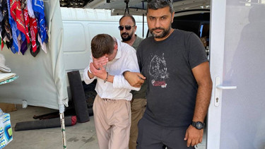 Antalyada sahte dövizle alışveriş yaparken yakalandı