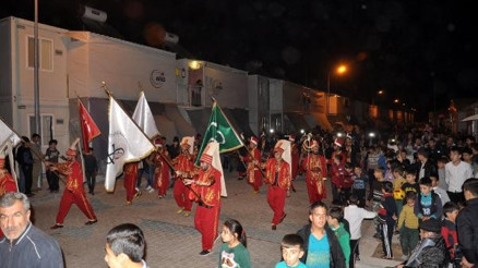 Barınma merkezinde sığınmacılar, Sarıkamış Şehitlerini andı