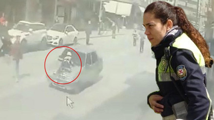 Kadın polisi metrelerce aracın kaputunda sürükledi, vatandaşlar durdurdu