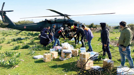 Dağ köylerine havadan yardım zinciri Dağ köylerine havadan yardım zinciri