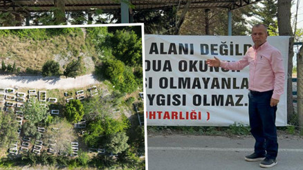Mezarlıktaki manzara muhtarı isyan ettirdi Tepkisini pankart asarak gösterdi