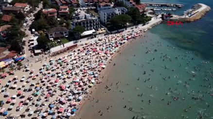 Tatilcilerle dolan Kandıra, Akdenizi aratmadı: Plajlar doldu
