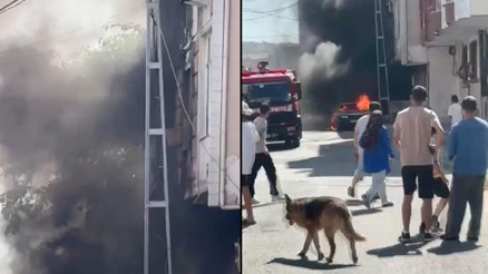 Park halindeki araç alev topuna döndü Yangın binaya sıçradı