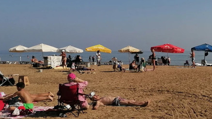 Hava sıcaklığı 30 dereceye çıktı: Kasım ayında deniz keyfi yaptılar