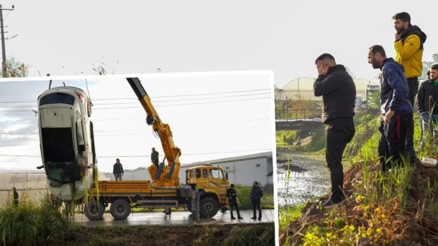 Kanala uçan cipte ölen eşinin cenazesinin çıkarılmasını gözyaşlarıyla izledi