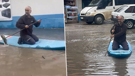 İlçede etkili olan sağanak sonrası sokakları su bastı: Araç tamir ustası SUP board yaptı