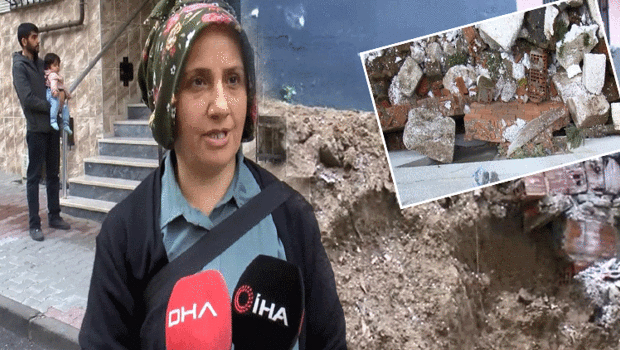 Deprem gibi! İstinat duvarı yan binanın üzerine düştü