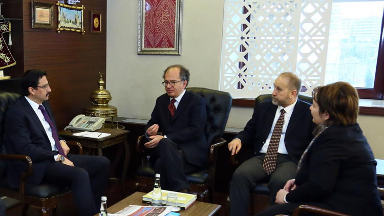 Göçmenler için iş birliği Göçmenler için iş birliği