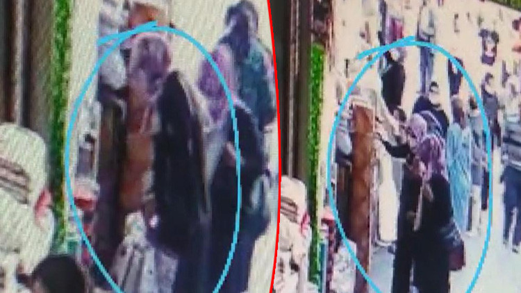 2 kadının battaniye hırsızlığı kamerada