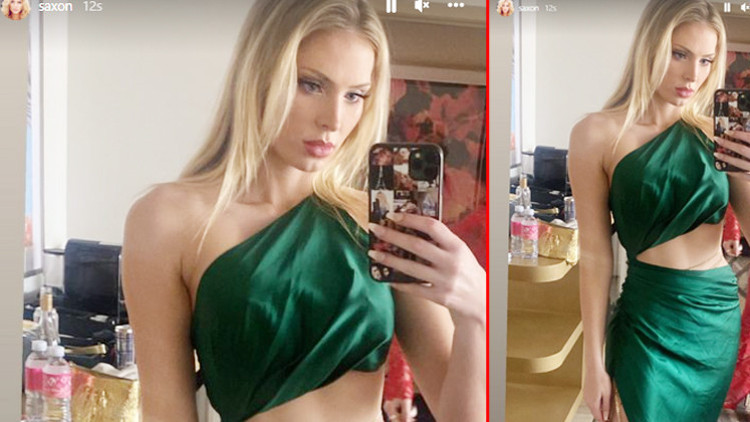 Biri market poşetiyle diğeri buruşuk elbiseyle kırmızı halıda Biri market poşetiyle diğeri buruşuk elbiseyle kırmızı halıda