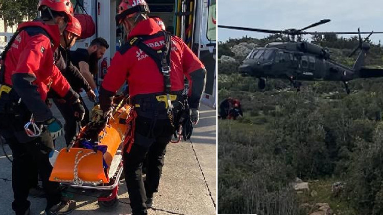 Dağlık alana düşen paraşütçü, jandarma helikopteriyle taşındı
