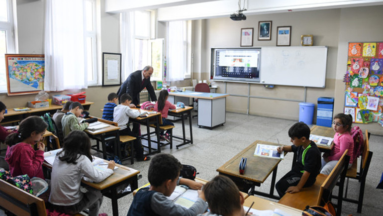 14 öğrenci, 1 öğretmen