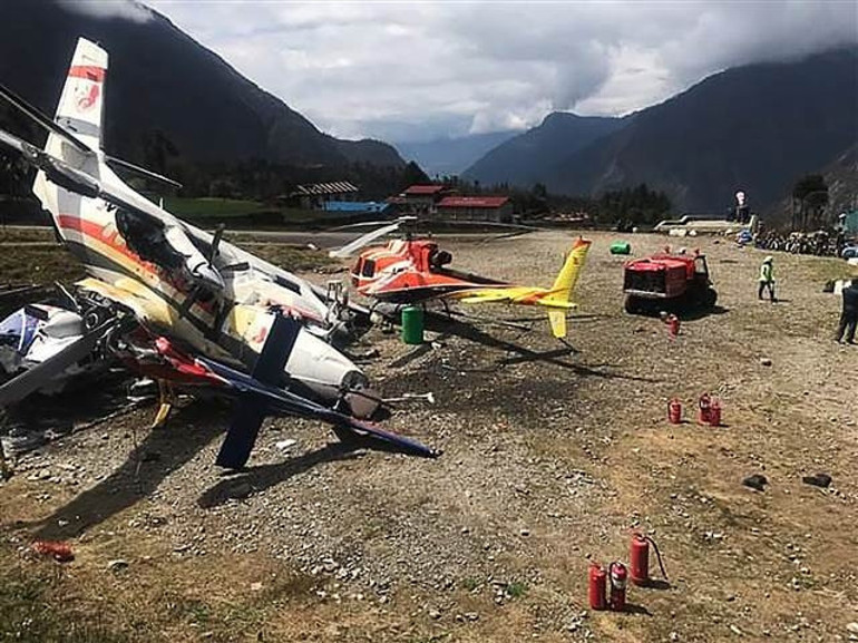 Nepalde uçak pistteki helikoptere çarptı: 3 ölü