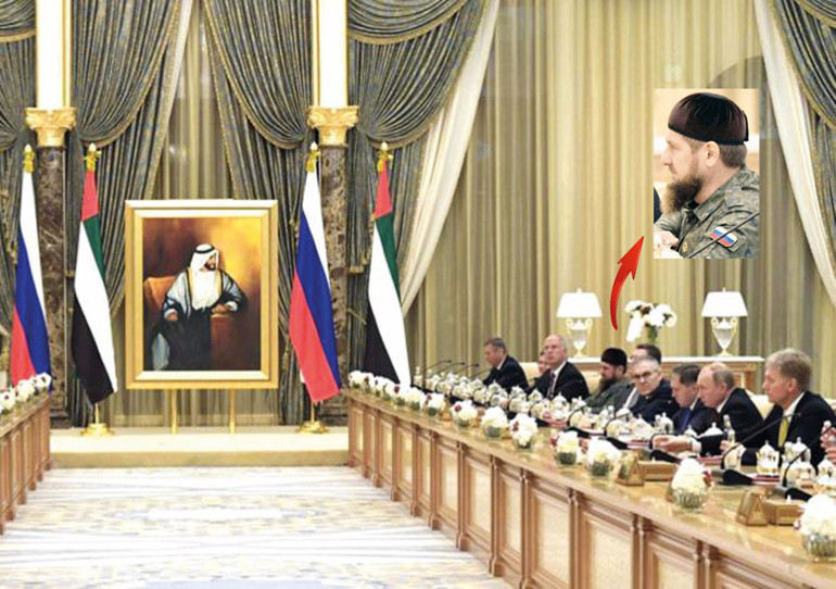 Dostumuz Putinin masasındaki bu üniformalı sakallı da kim