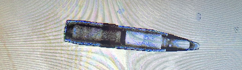 Havalimanında havan mermisiyle yakalandı