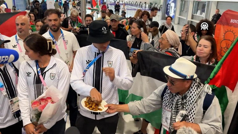 Filistinli sporcular, Pariste coşkuyla karşılandı