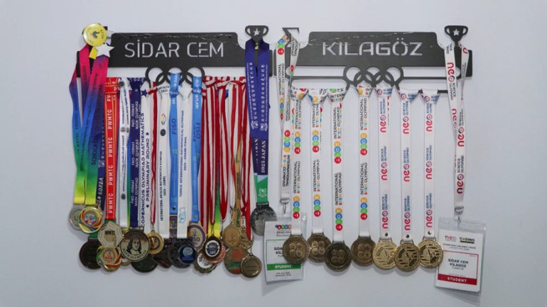  11 yaşındaki Sidar, Amerikadaki olimpiyatlarda dünya birincisi oldu