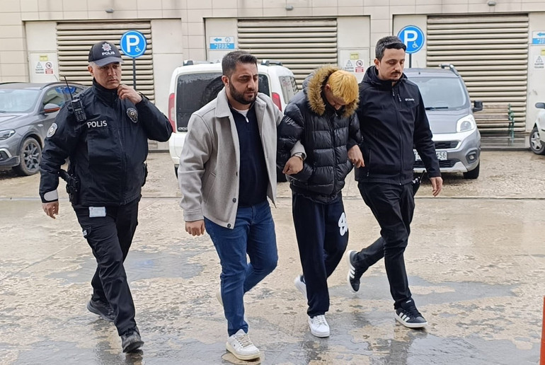 Camide çıplak çekim skandalı Adliyeye sevk edildi, saçları dikkat çekti