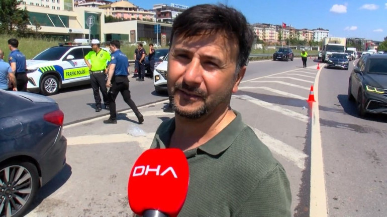 Yanan araçtaki sürücüyü vatandaşlar kurtardı