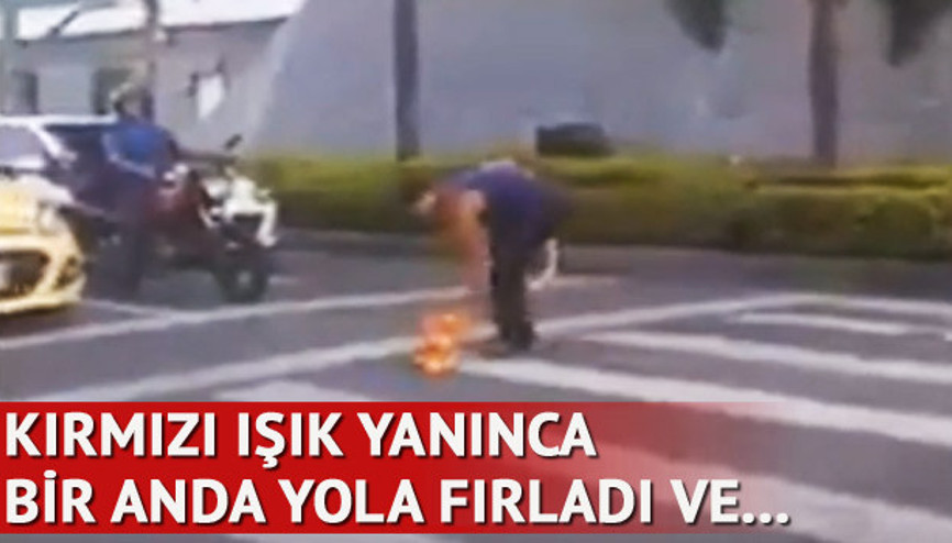 Kırmızı ışık yanınca bir anda yola fırladı
