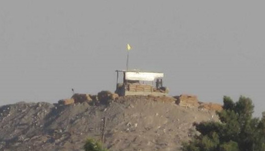 PYD, Telabyad’da mevzi kurdu, bayrak çekti