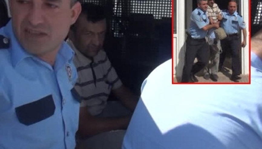 Başbakan Davutoğlunun afişleri yırtıldı: 1 kişi gözaltında