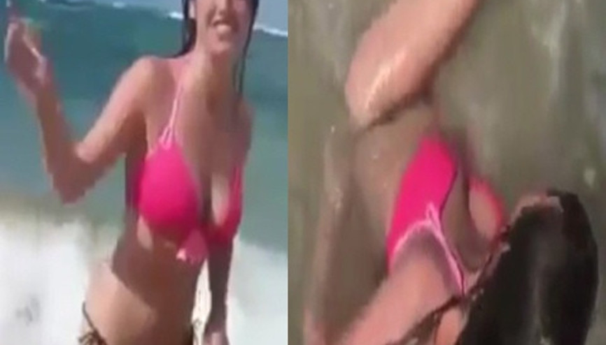 Denizdeki dalgalar kadının bikinisini çıkardı