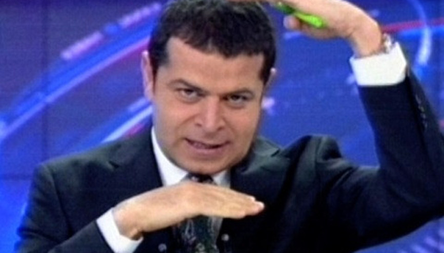 Cüneyt Özdemirden seyirciye kravat tepkisi