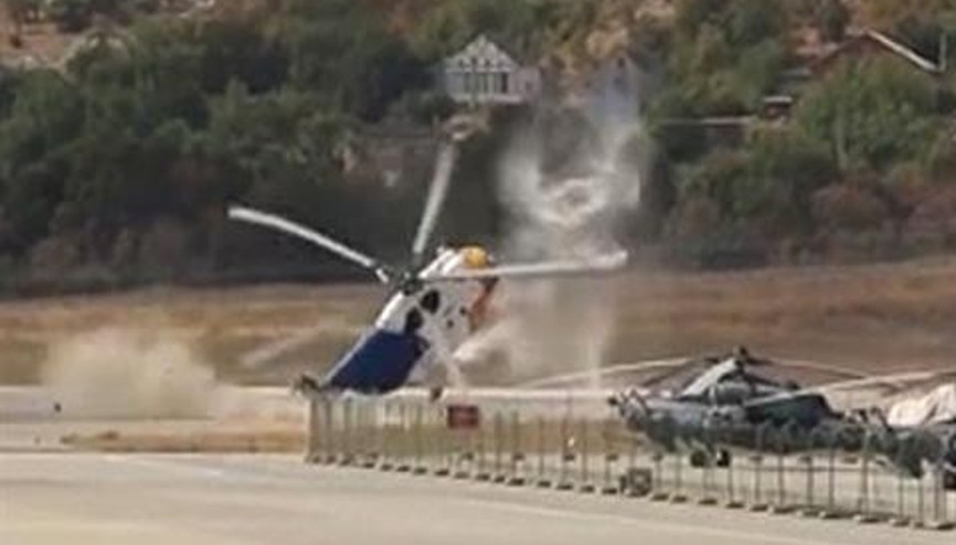 Hızlı iniş yapan helikopter alev topuna döndü Hızlı iniş yapan helikopter alev topuna döndü