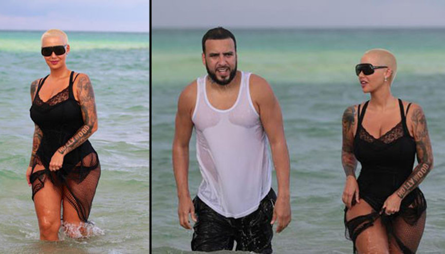 Beyaz atletle denize girdi