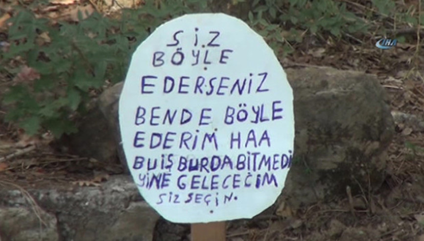 Mezarı tahrip edip  Bu iş bitmedi mesajını yazan şüpheli yakalandı