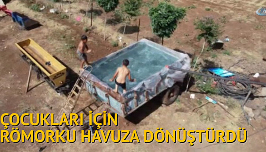 Çocukları sıcaktan bunalan baba römorku havuza çevirdi