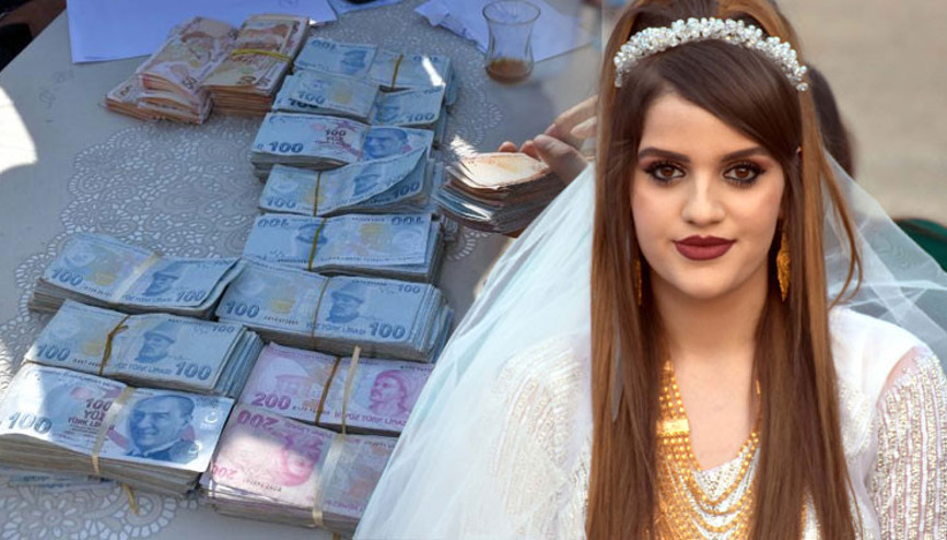 Aşiret liderinin kızına düğünde takılan para ve altın dudak uçuklattı Aşiret liderinin kızına düğünde takılan para ve altın dudak uçuklattı