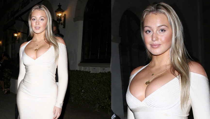 Yanındaki adam merak uyandırdı