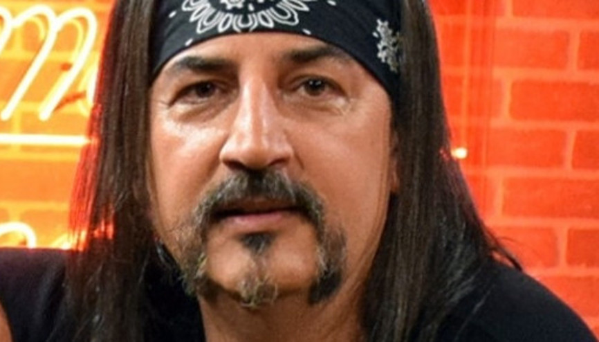 Çelik Erişçi kimdir