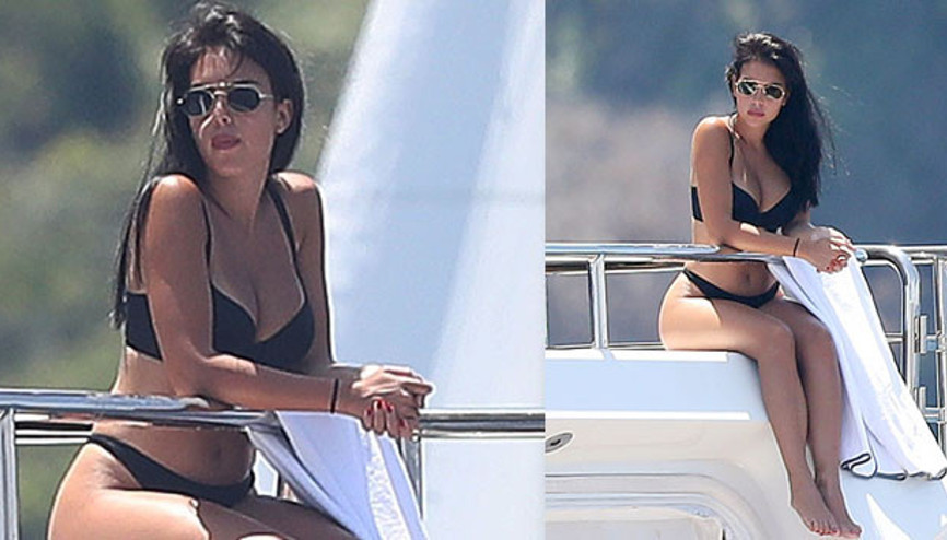 Lüks yatın güvertesinde uzaklara dalıp gitti