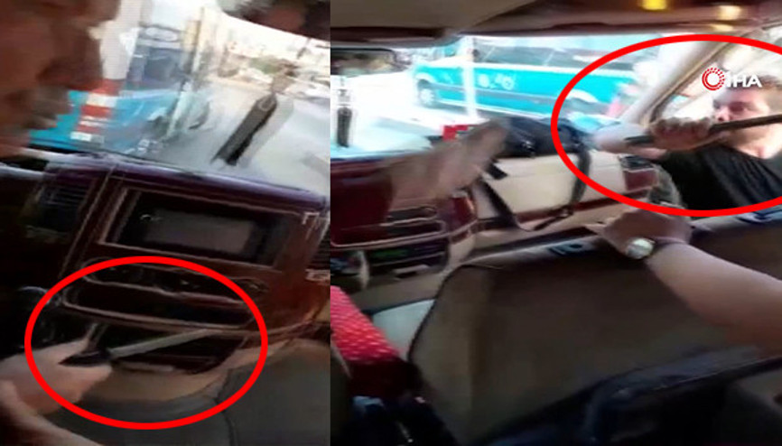 Minibüsçülerin bıçak ve levyeli yolcu alma kavgası kamerada