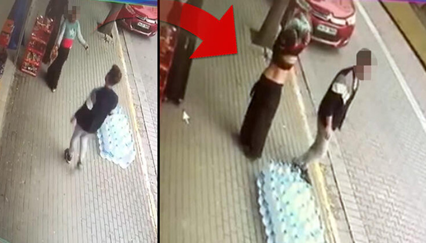 Parayı almakla suçlanınca sokak ortasında soyundu