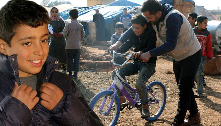 Babamdan sonra ceket alan olmadı diyen Suriyeli Fuada mont ve bisiklet hediyesi Babamdan sonra ceket alan olmadı diyen Suriyeli Fuada mont ve bisiklet hediyesi