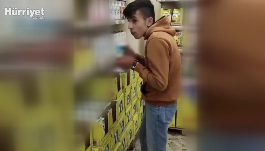 Market raflarındaki sütü içip video çekti