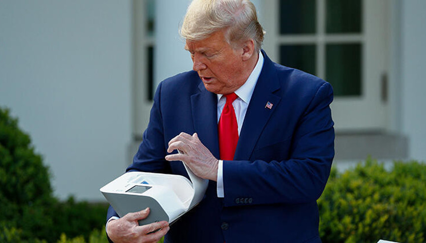 Trump, N95 maskesini dezenfekte eden cihazı tanıttı