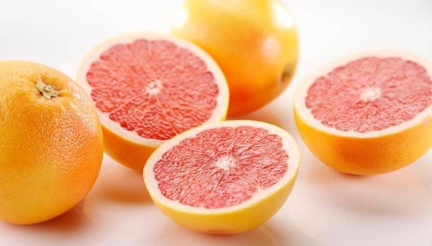 Düz bir karın için greyfurt tüketin