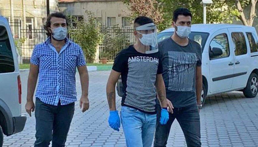 Ateşi yüksek çıkan şüpheli; maske, siperlik ve eldivenle adliyede