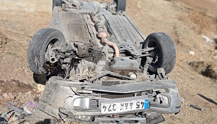 Takla atan otomobilden yara almadan kurtuldu