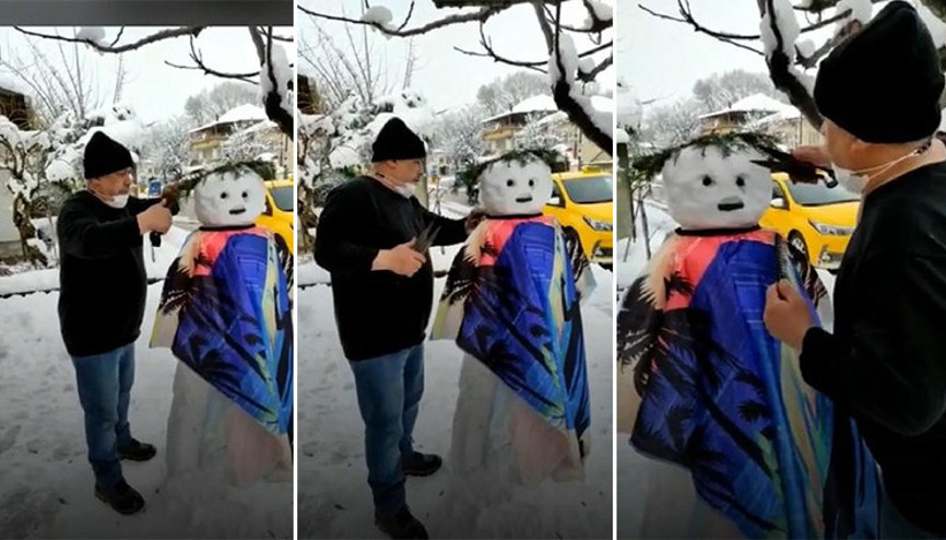 Berber, yaptığı kardan adamı tıraş etti
