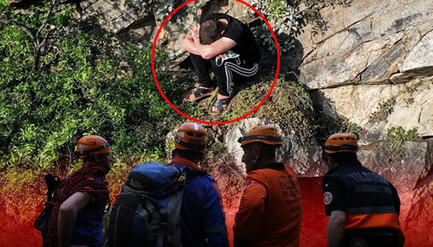 Polisten kaçmak için tırmandığı kayalıkta mahsur kaldı