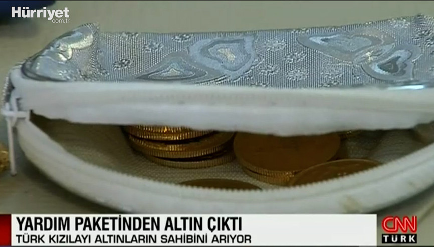 Yardım paketinden altın çıktı Yardım paketinden altın çıktı