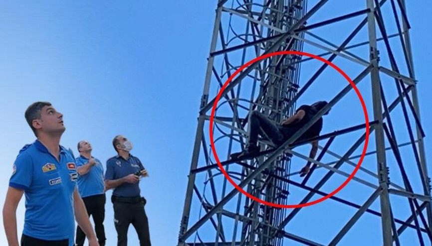 Bursada alkollü olduğu iddia edilen bir kişi, çıktığı direkte uyudu