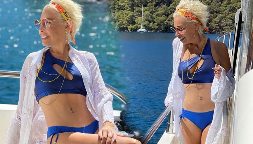 Photoshopu abarttı... Göbek deliğini yok etti